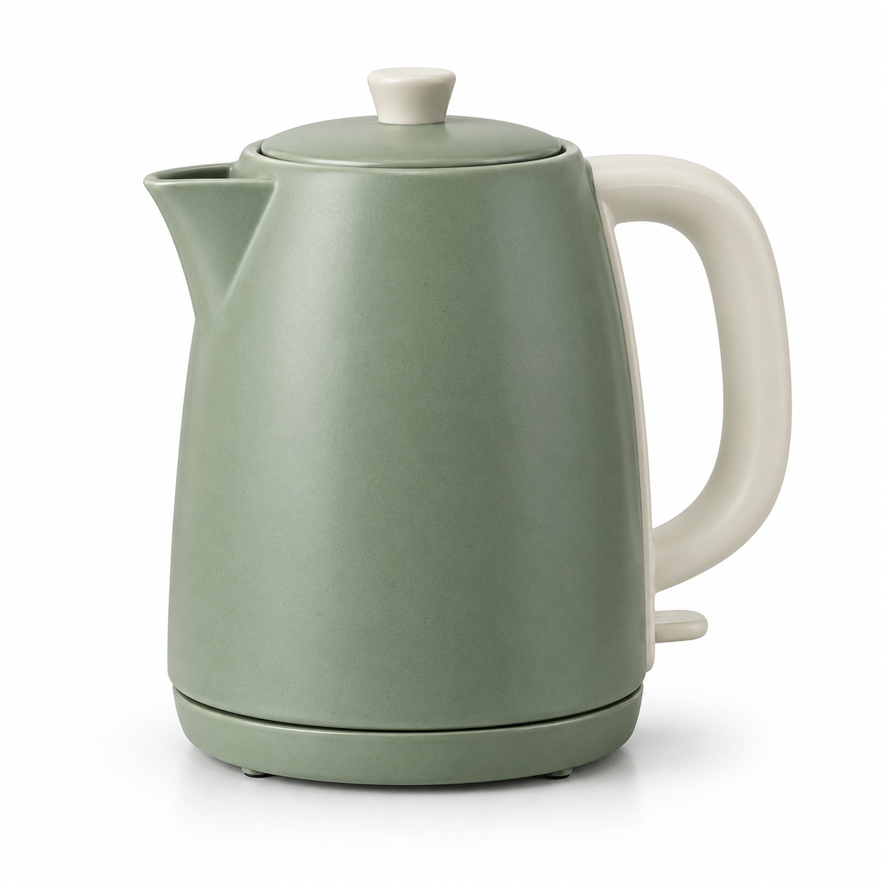 Sage-green kettle with a cream handle on a white background and a soft contact shadow.